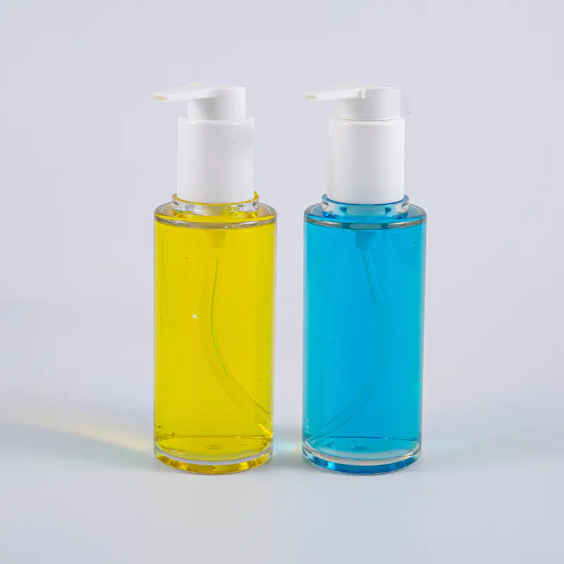 Transparente 100-ml-Lotionsflasche aus PETG in runder Form mit weißer Kunststoffpumpe